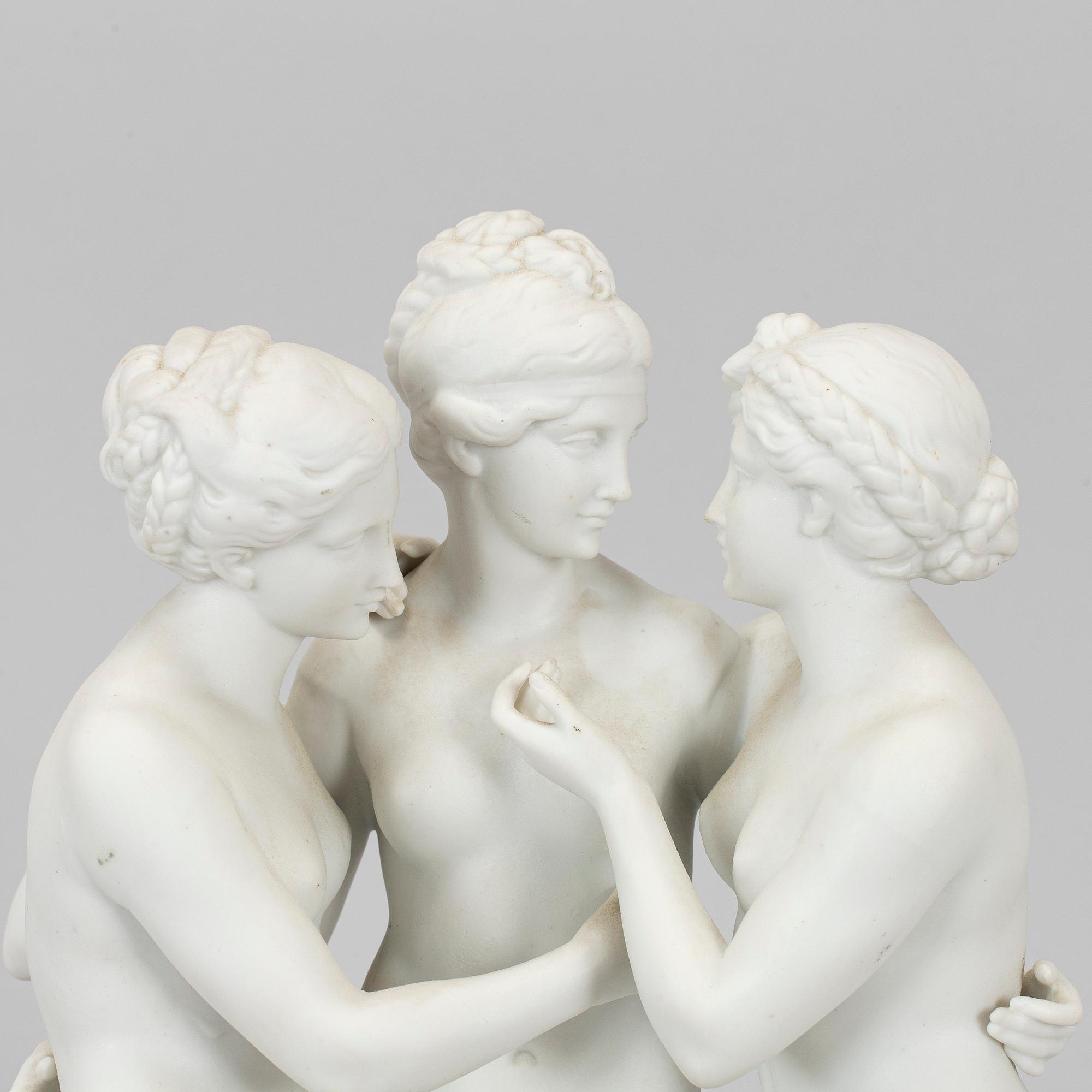 A porcelain figurine, Three Graces.