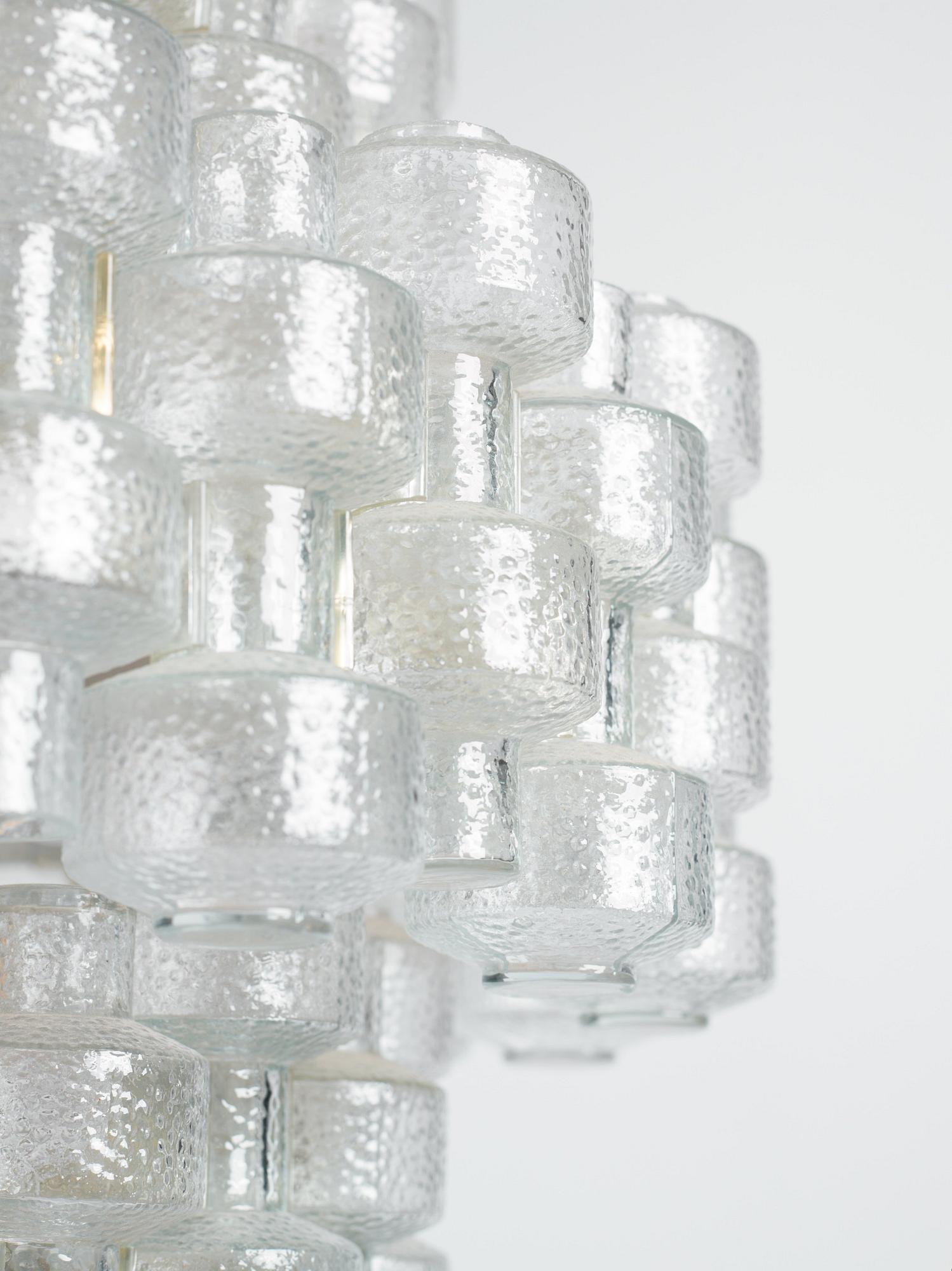 Gert Nyström, a pair of "Festival" chandeliers, Fagerhult, 1960s-70s.