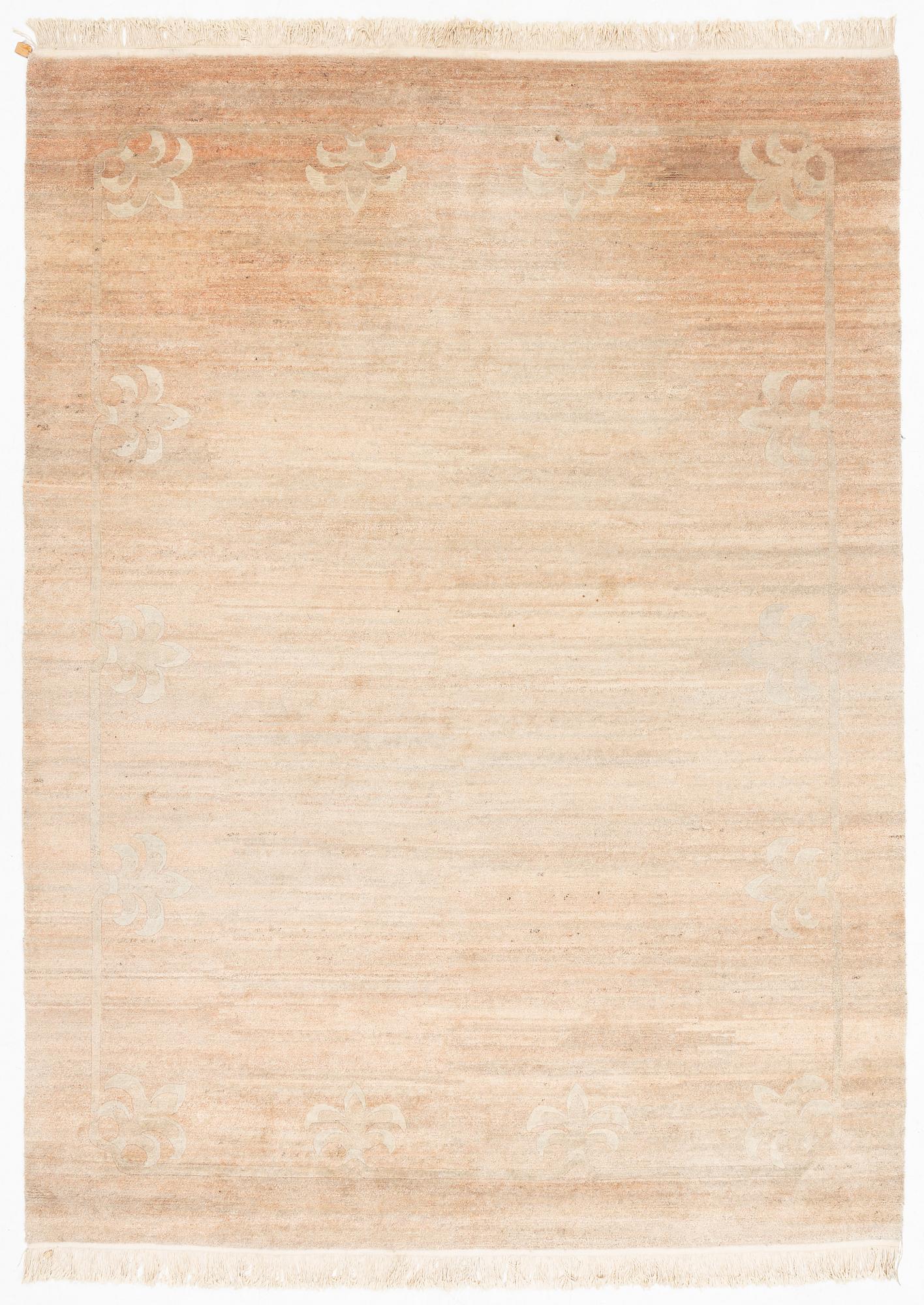 A Chinese carpet, c. 330 x 270 cm.