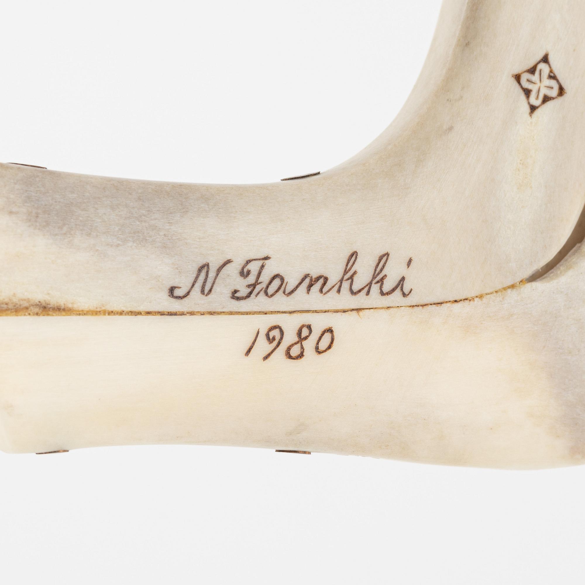 Nikolaus Fankki, A reindeer horn knife, signed and dated 1980.
