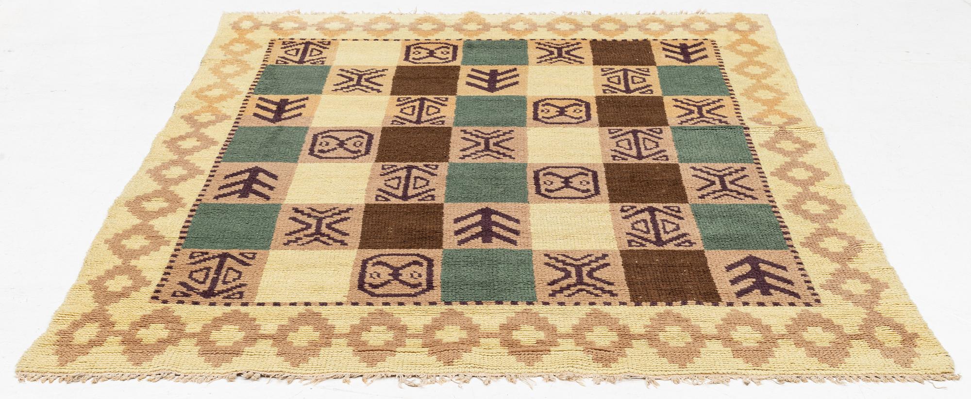 A Swedish knotted pile carpet, c 243 x 175 cm.