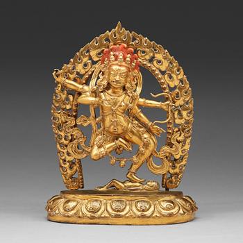 12. A gilt bronze figure of Kurukulla, presumably circa 1900.