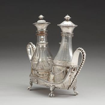BORDSSURTOUT för fyra flaskor, av Petter Eneroth, Stockholm 1787. Gustaviansk.