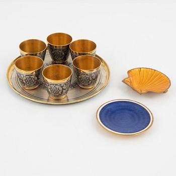 6 Russian 20th century silver beakers with niello, a small tray and two miniature enamel dishes.