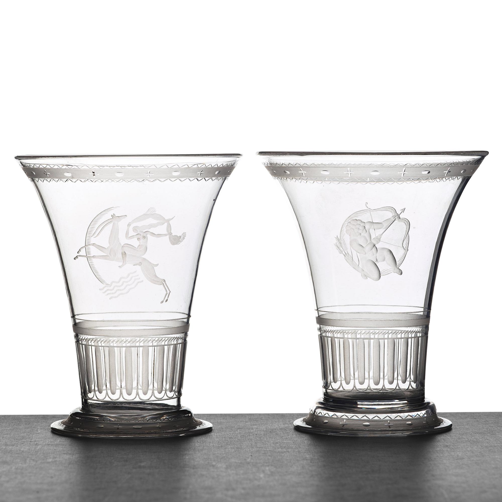 Simon Gate, two Swedish Grace engraved glass beakers, Orrefors, Sweden 1924.