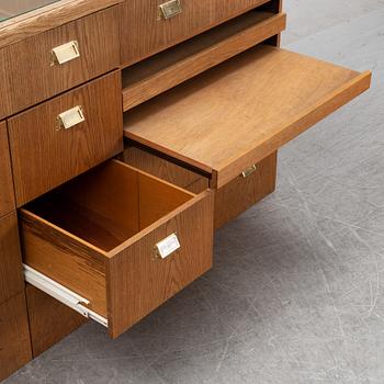 An oak shop counter.