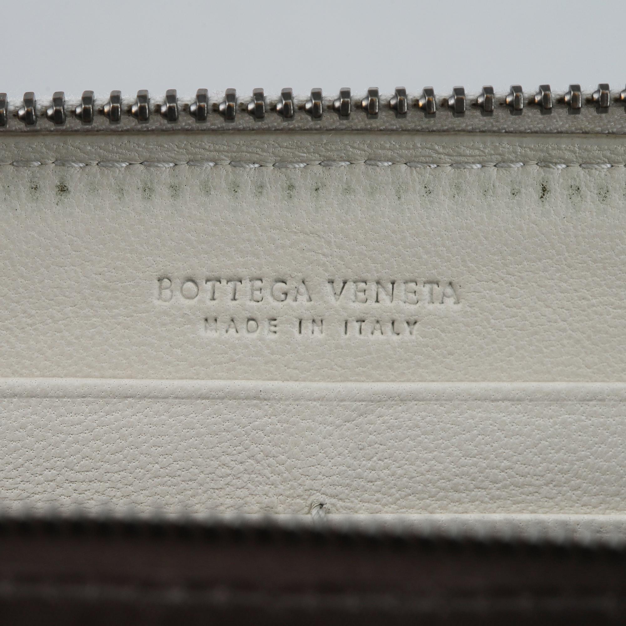 BOTTEGA VENETA, a intrecciato leather wallet.