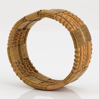 Vivianna Torun Bülow-Hübe, a rattan and brass bangle, executed in her own workshop, 1945-50's.