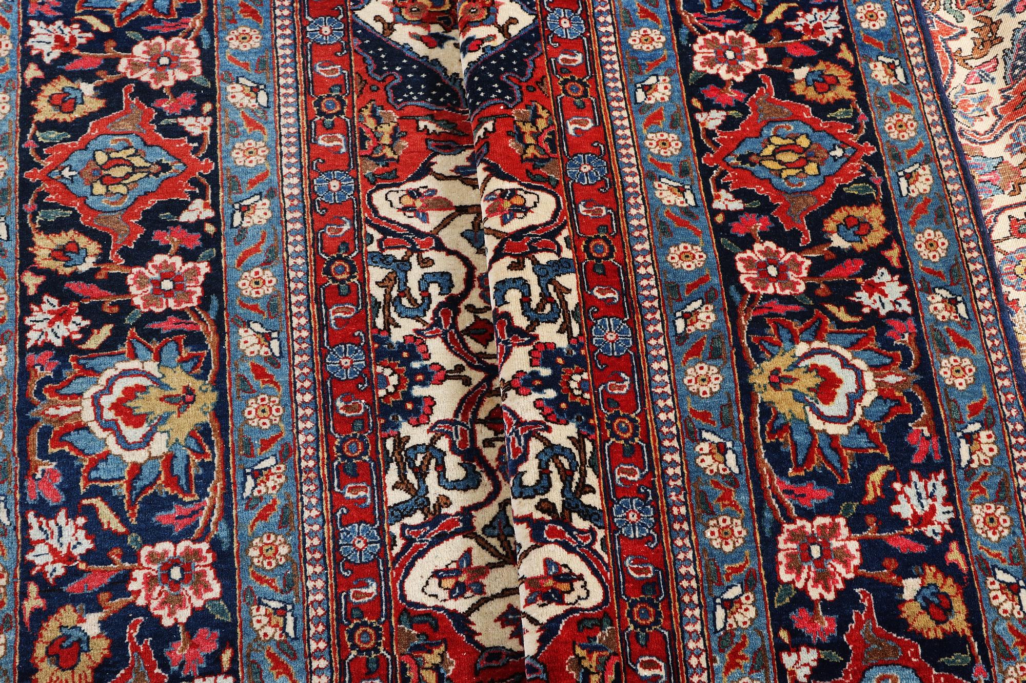 A semi.antique Kashan, c. 319 x 212 cm.