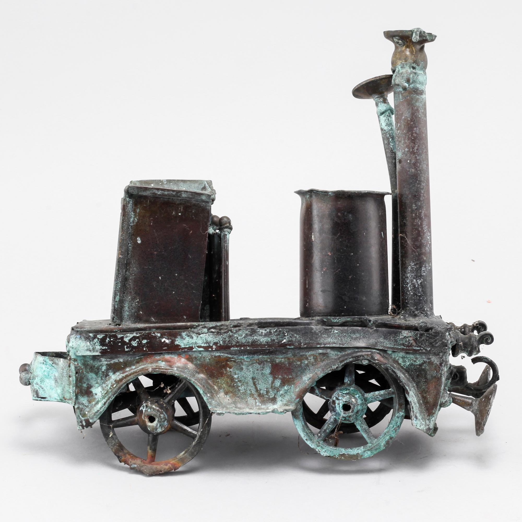 a metal sculpture, not signed.