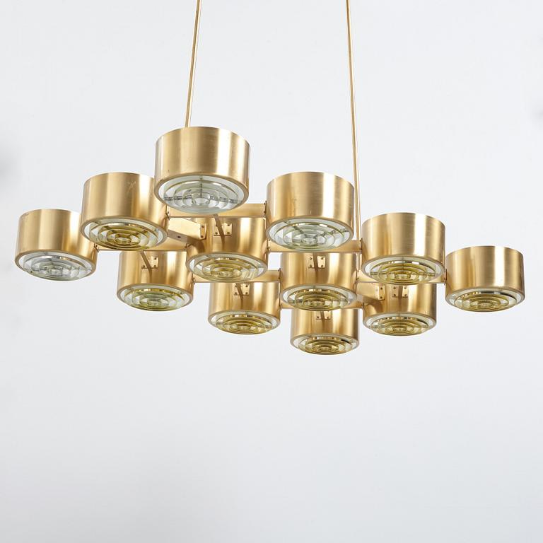 Hans-Agne Jakobsson, A Hans Agne Jakobsson twelve light brass chandelier, model T 363/12, Markaryd, Sweden 1960-70's.