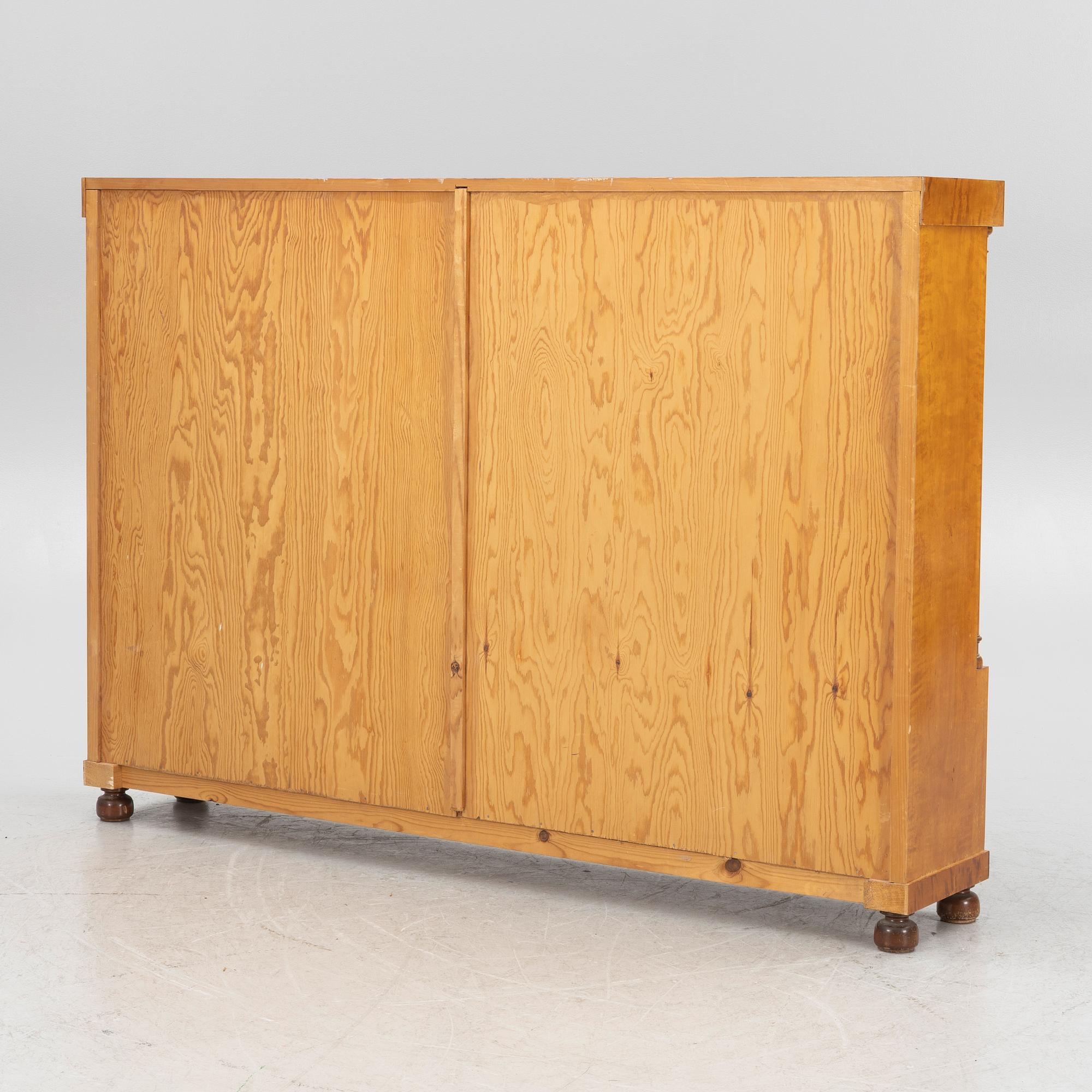 An Empire style bookcase, first half of the 20th century.