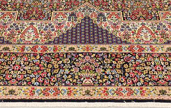 A Kirman Laver carpet, 'Millefleur', approx. 392 x 300 cm.