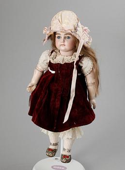 905. A probably French bisquit doll, 19th/20th century.