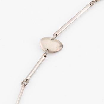 Georg Jensen, a necklace and a pair of earrings, sterling silver.