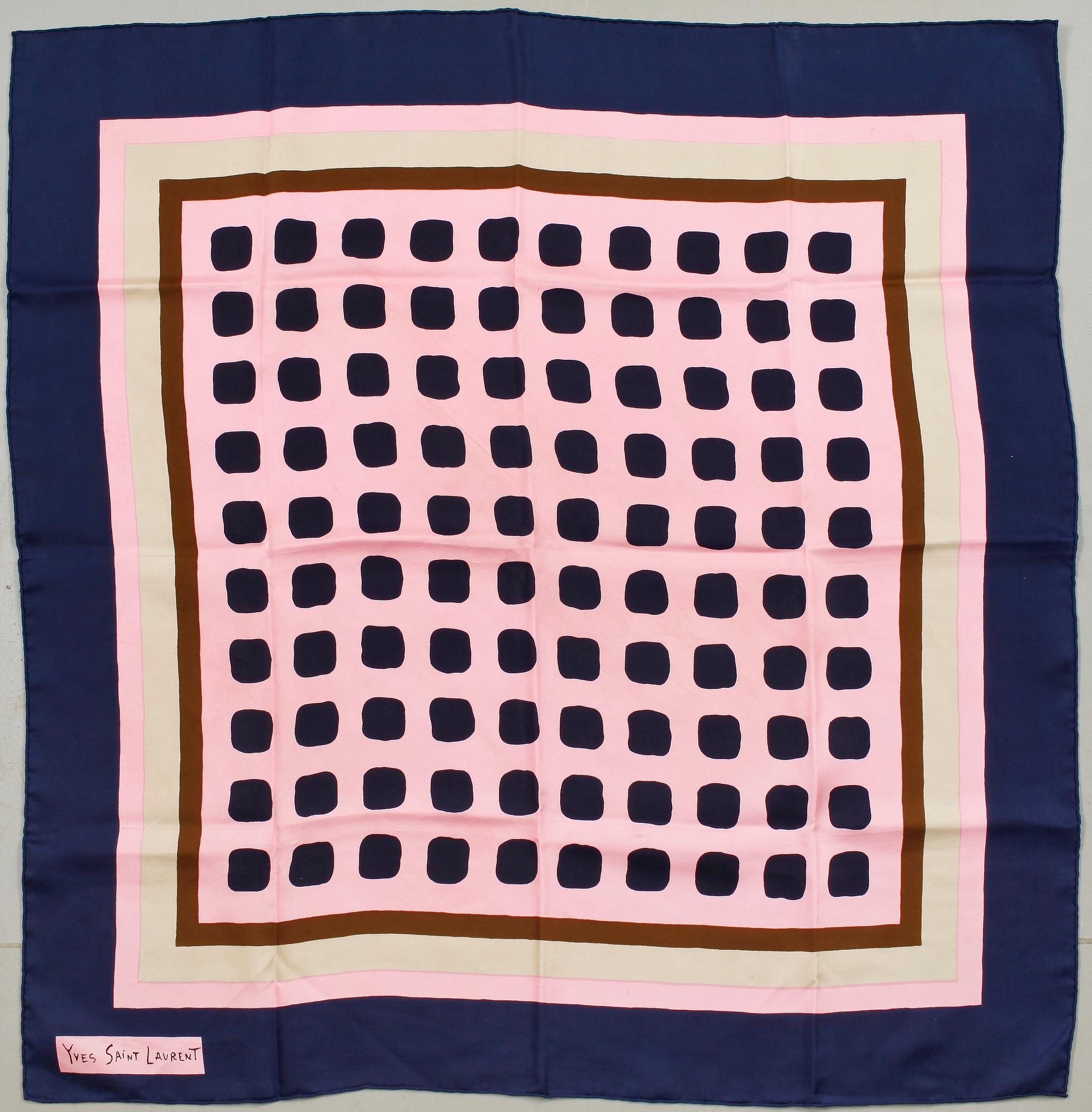 A silk scarf by Yves Saint Laurent.