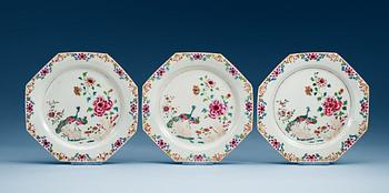 A set of three famille rose 'double peacock' dinner plates, Qing dynasty, Qianlong (1736-95).