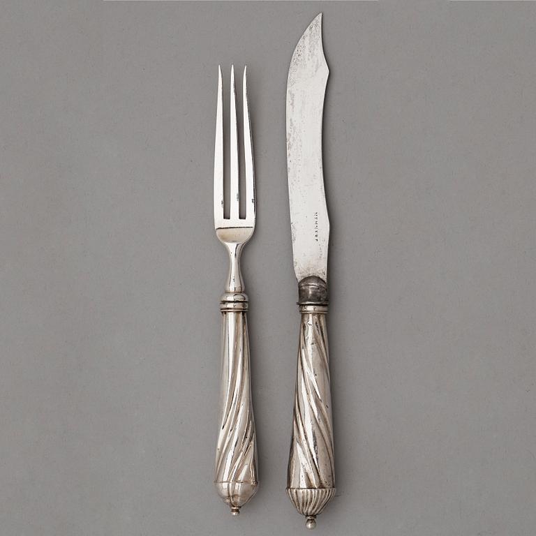 A set of twenty 18th century silver knifes and forks, unidentified marks.