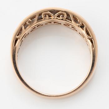 14K rose gold ring with round brilliant-cut diamonds.