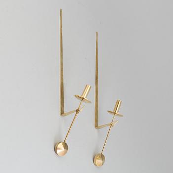 A pair of 20th century brass wall candleholders "Pendel" design Pierre Forssell for Skltuna, Sweden.