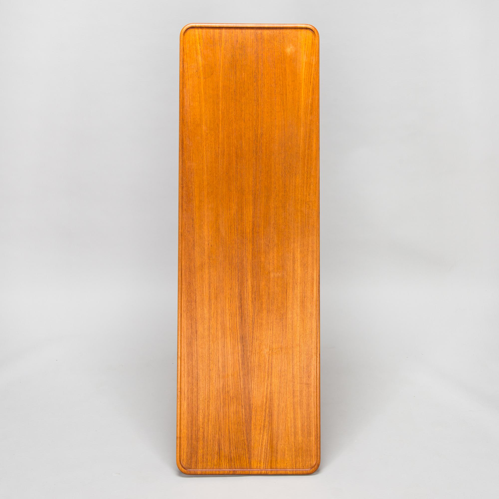 An oak and tek coffee table by Hans J Wegner for Andreas Tuck, 1960s.