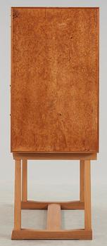 A Josef Frank burrwood, mahogany and walnut cabinet, Svenskt Tenn, model 881.