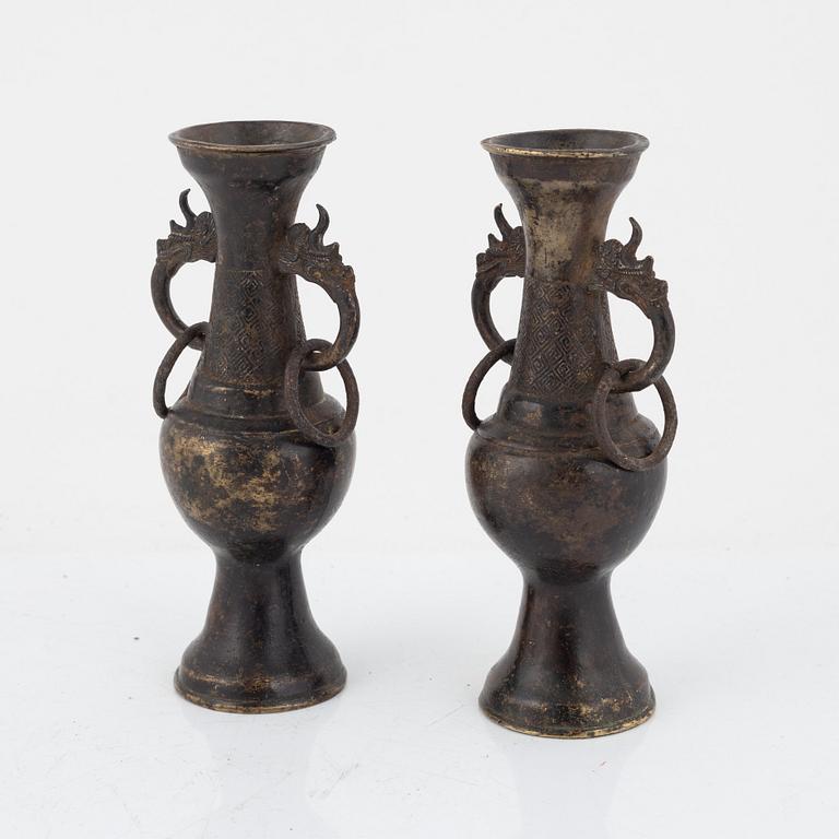 A pair of Chinese bronze altar vases, Ming dynasty (1368-1644).