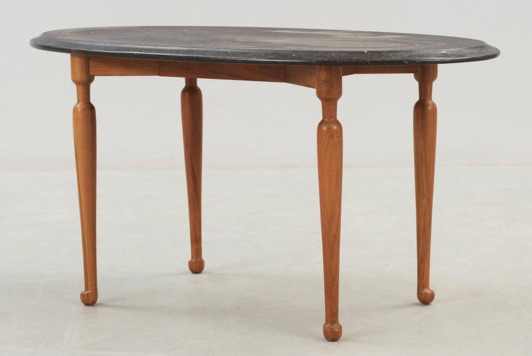 A Josef Frank black marble top table, Svenskt Tenn.