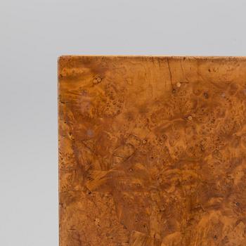 An burr alder veneered folding table, circa 1800.