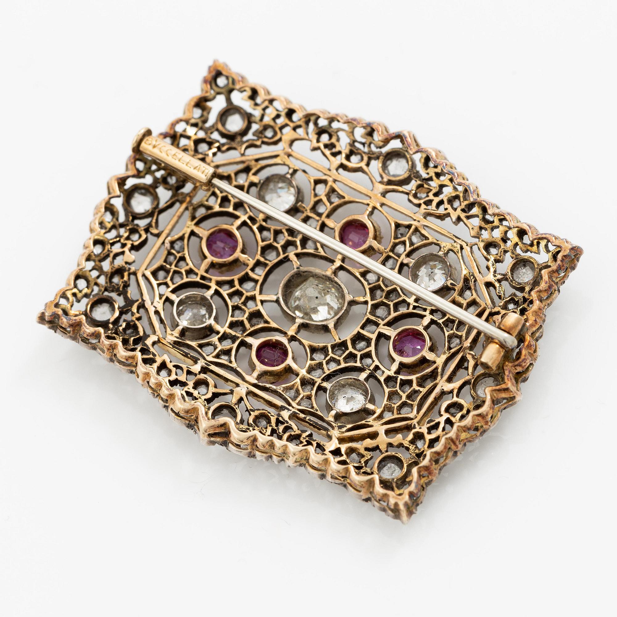 Buccellati brosch 14K guld och silver med gammal- och rosenslipade diamanter och rubiner.