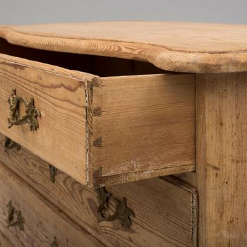 A mid 18th century late baroque chest of drawers.