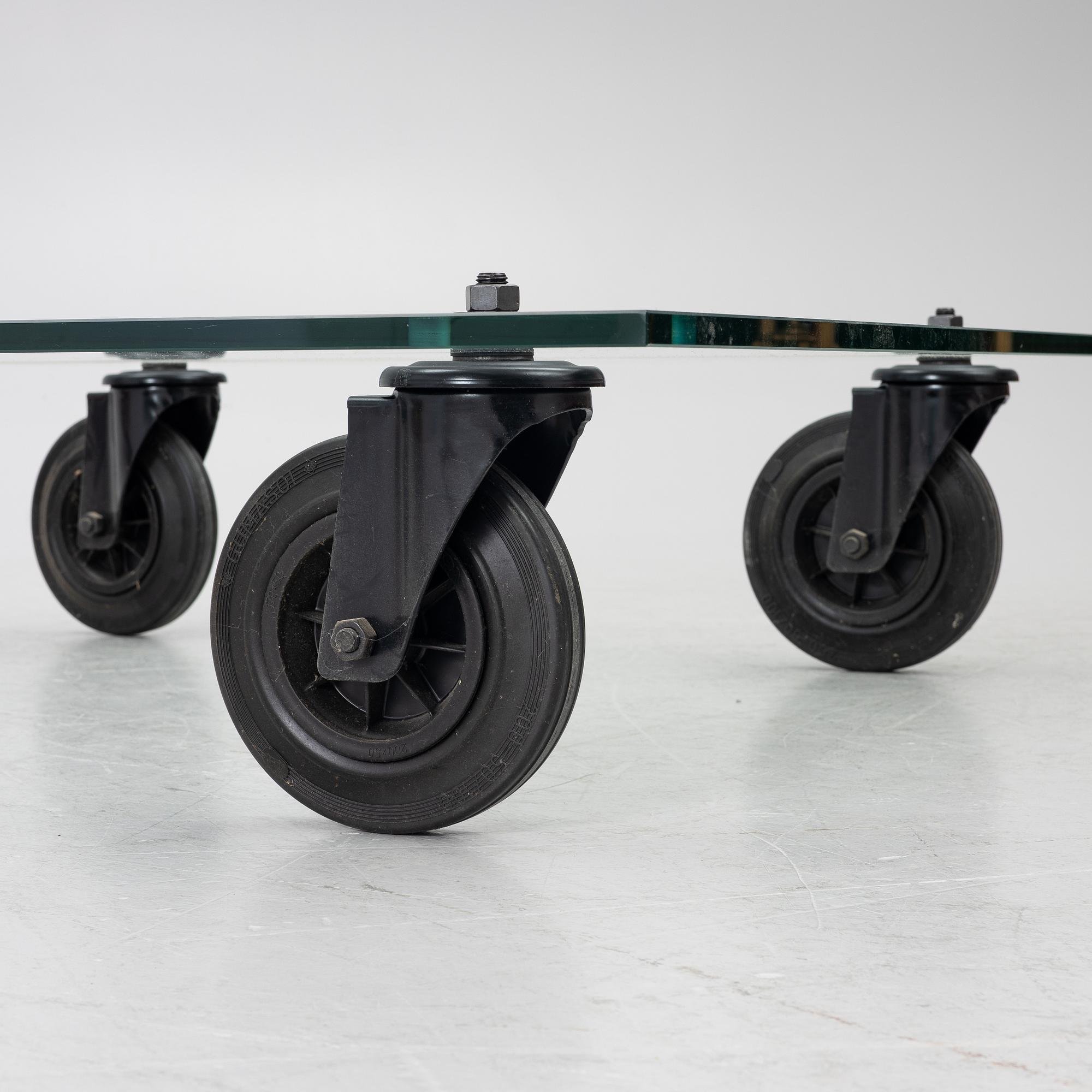 Gae Aulenti, coffee table, “Tavolo con Ruote”, Fontana Arte, Italy, late 20th/early 21st century.
