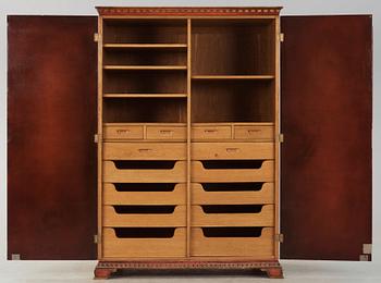 An Axel Einar Hjorth red lacquered wardrobe, 'Åbo', Nordiska Kompaniet 1929.