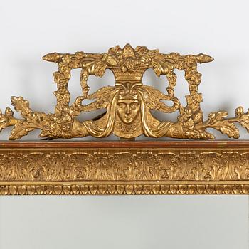 A mirror wall sconce for two candles, Empire, first half of the 19th Century.