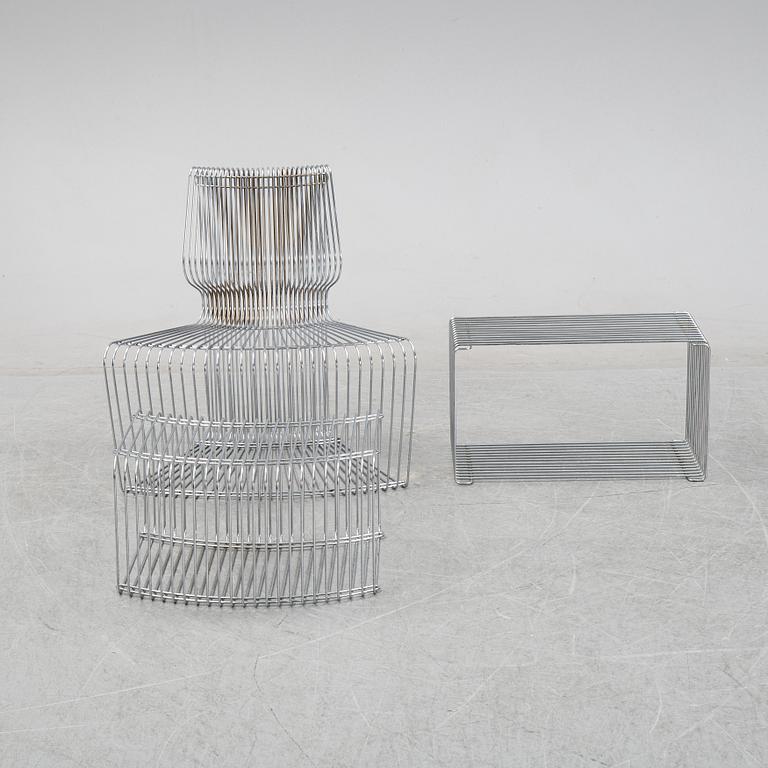 A 'Pantanova convex' chair with foot stool and a 'Wire Extendted' shelf, Verner Panton, Montana, Denmark.