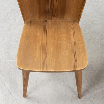 Göran Malmvall, a set of four pine chairs and a rocking chair, Svensk Fur, mid 20th Century.