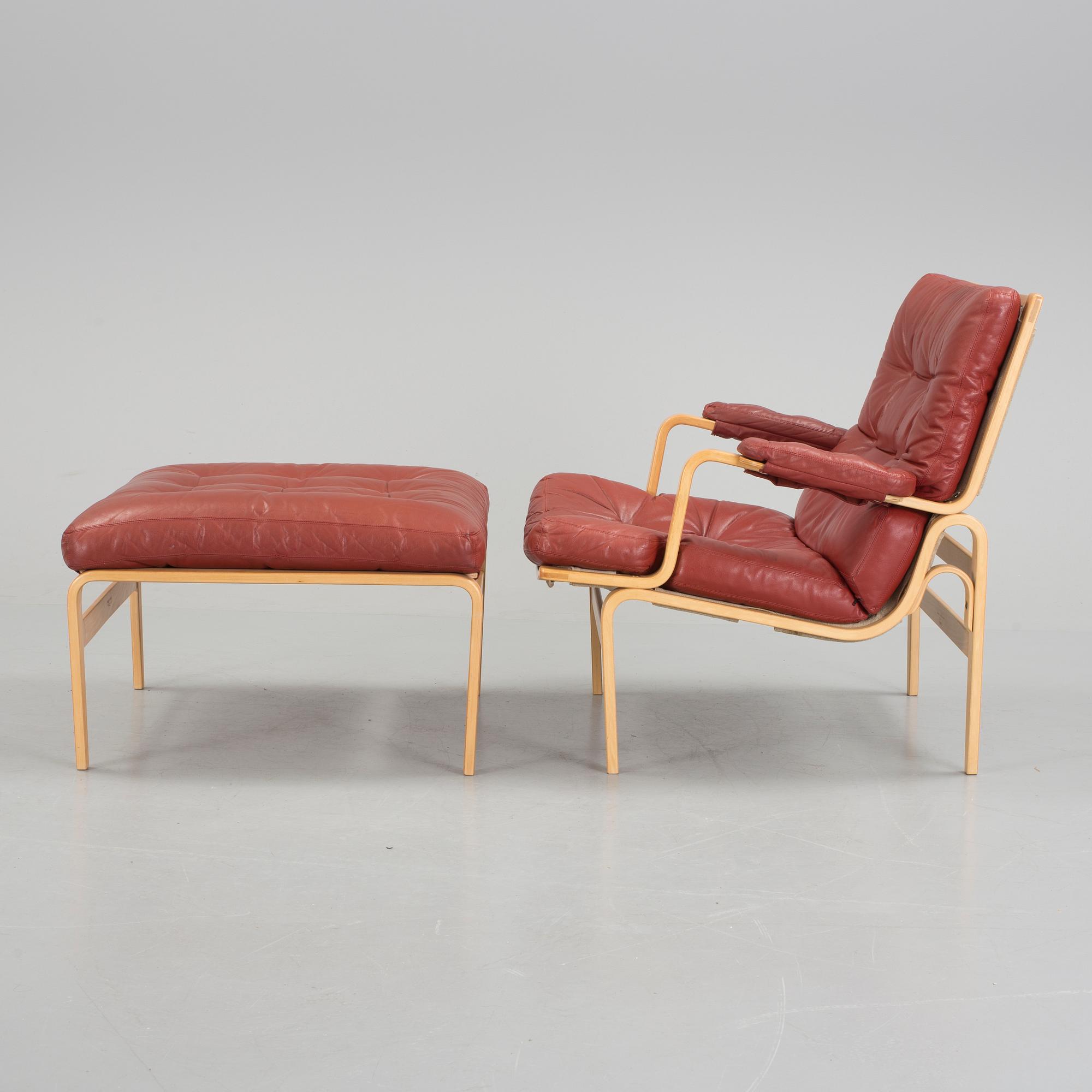 BRUNO MATHSSON, "Ingrid", fåtölj och fotpall, DUX design, 1969.