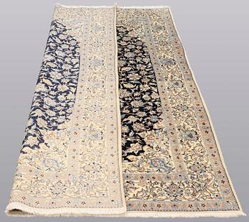 A rug, Nain part silk s.k 6LAA, ca 248 x 155 cm.