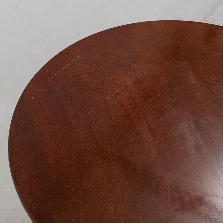 A pair of mahogany sidetables by Arthur Brett & Sons, Norwich, England.