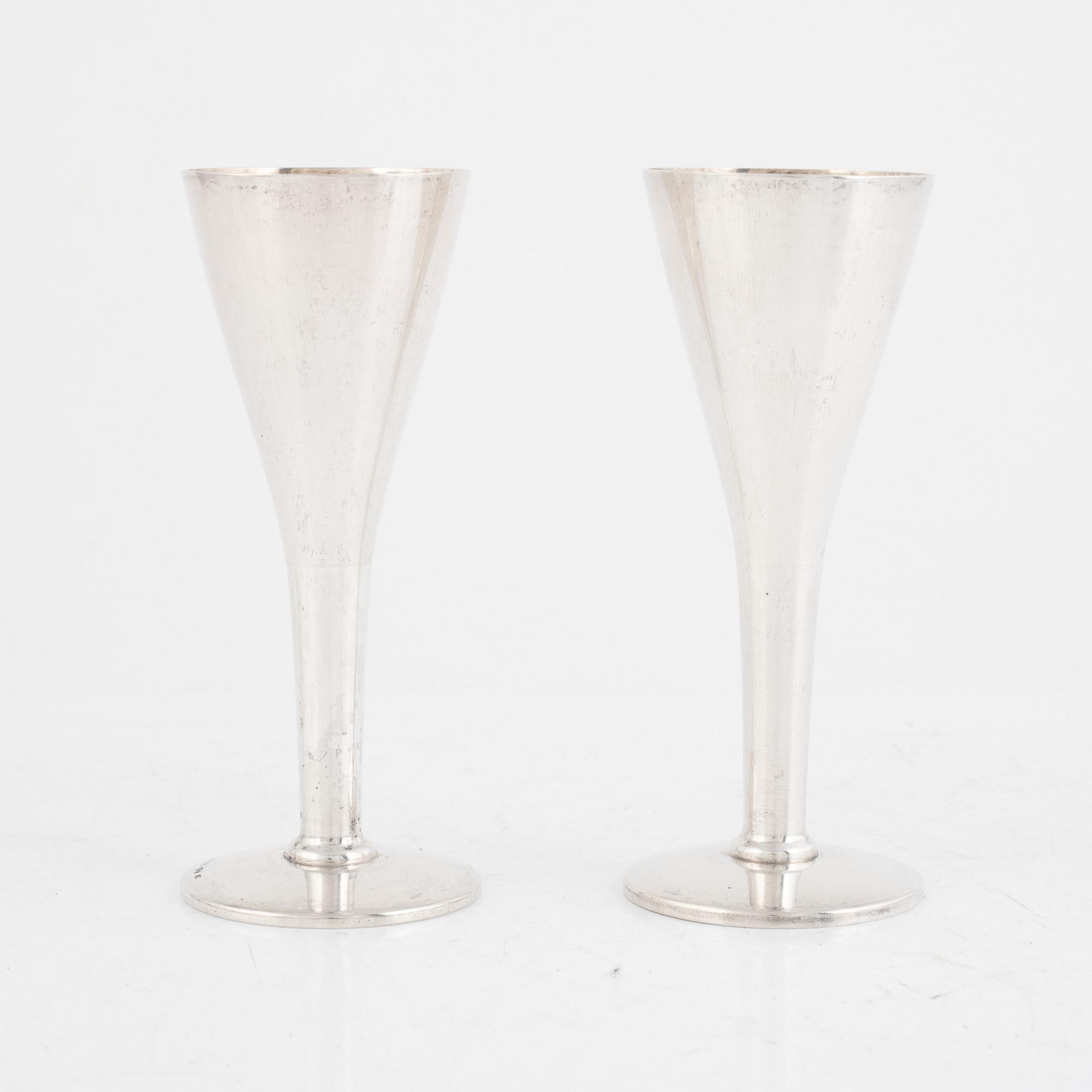 A set of five silver beakers, including MGAB, Stockholm 1946.