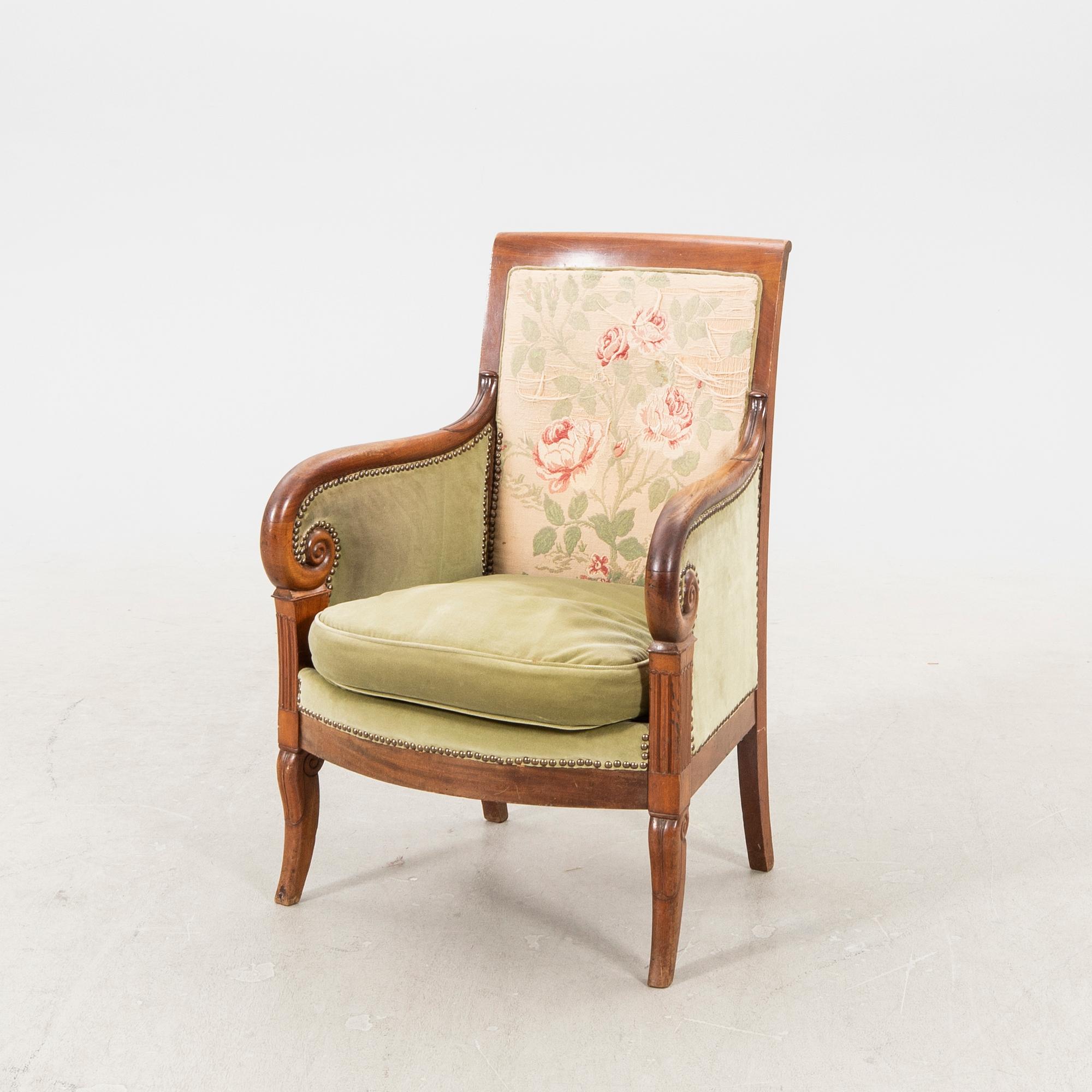 A mid 1800s mahogany bergere.