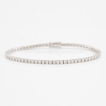 Tennis bracelet in 18K white gold with brilliant-cut diamonds, including HRD report.