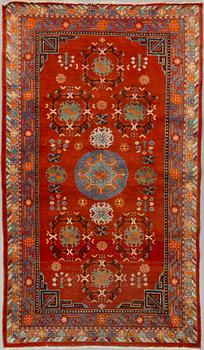 A russian or East Turkestan rug, around 224 x 130 cm.