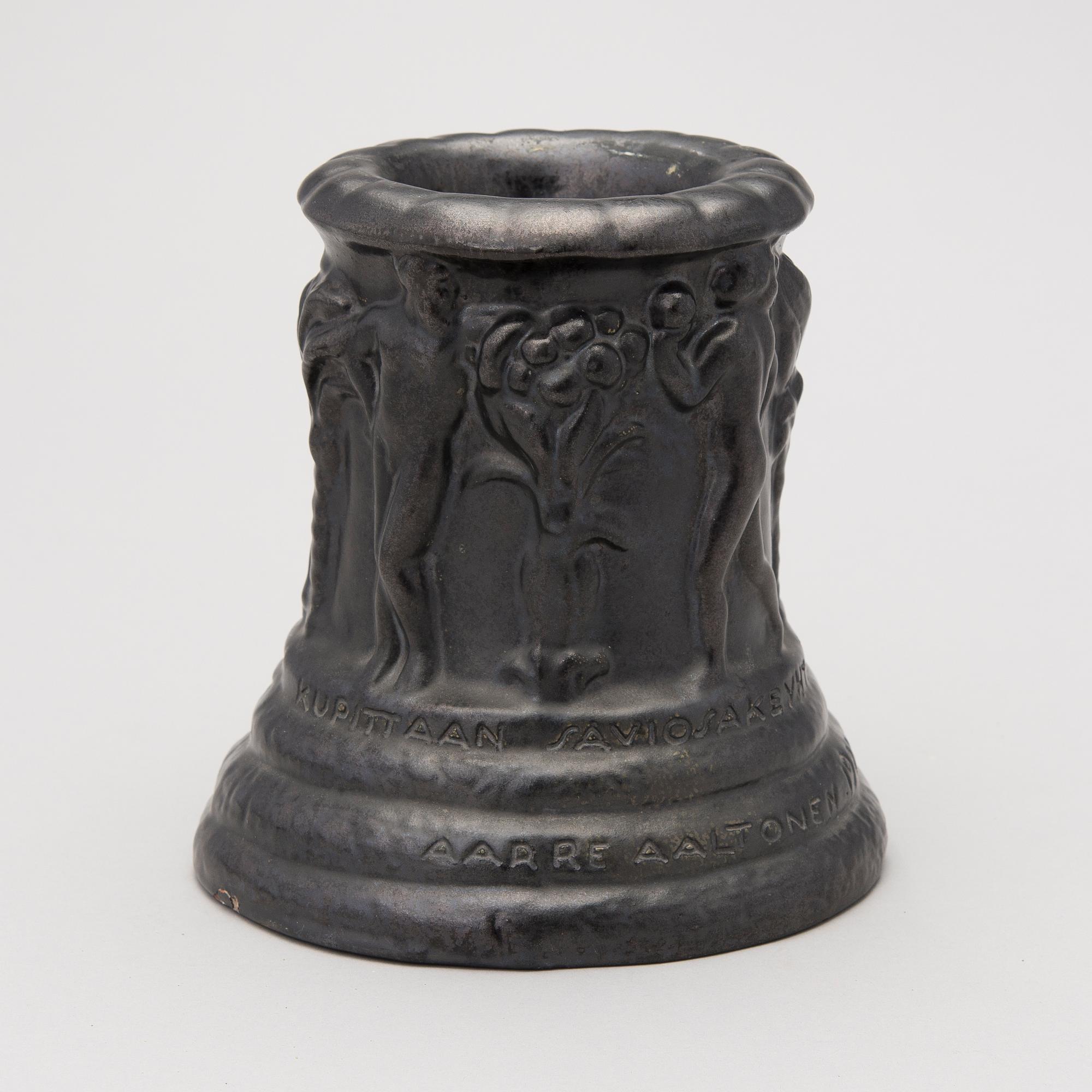 a plaster decoration bowl, signed Aarre Aaltonen 1923.