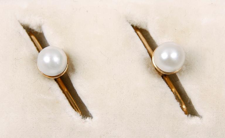 SKJORTKNAPPAR, ett par, guld 18K, pärlor, Stockholm 1920.