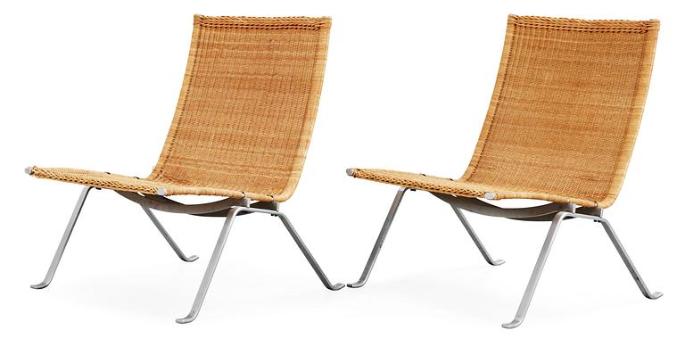 A pair of Poul Kjaerholm 'PK-22' steel and ratten easy chairs, E Kold Christensen, Denmark, maker's mark in the steel.