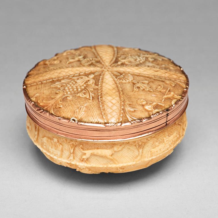 A 17th century bone and gold snuff-box.