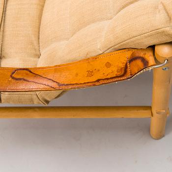 BROR BOIJE, A pair of 'Junker' easy chairs and an ottoman for Dux, Sweden, latter half of the 20th Century.