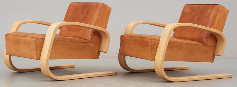 A pair of Alvar Aalto 'Nr 400' elk skin and birch armchairs, Artek, Finland.