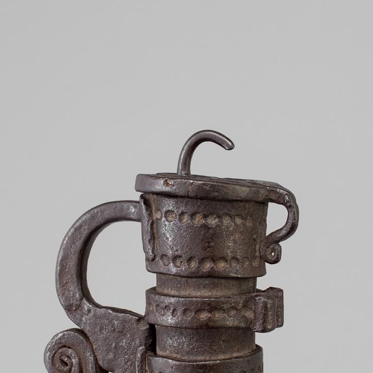 a 1700's-/1800's lock with a key.